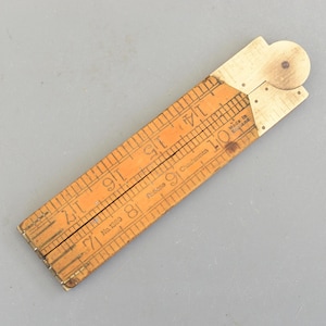 Zabytkowa składana linijka Rabone Chesterman England nr 1380 z bukszpanu i mosiądzu, 24''