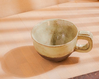 Green cup with square handle