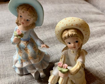 A Pair of Lefton China Figurines - Adorable Flower Girls. Exquisite - sold as a set.