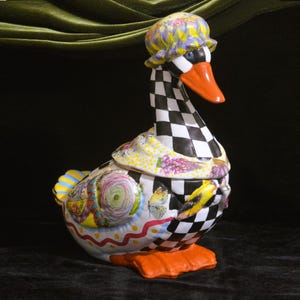 Whimsical hand-painted and decoupaged vintage Mother Goose ceramic cookie jar.