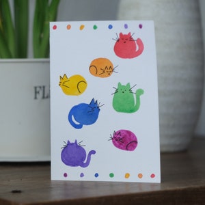 Scheda dei gatti dell'arcobaleno dell'acquerello dipinto a mano