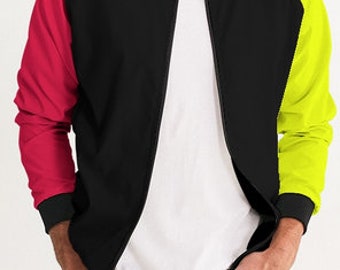 May include: A black bomber jacket with red and yellow color block panels. The jacket has a zipper closure and ribbed cuffs and waistband.
