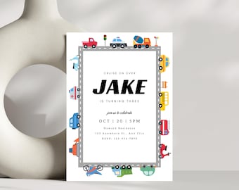 May include: A birthday party invitation with a road border featuring colorful cartoon vehicles. The invitation reads "CRUISE ON OVER JAKE IS TURNING THREE" with event details. The design includes a red truck, ambulance, and school bus.