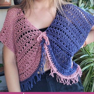 May include: A crochet cami top with a tie front and fringe trim. The top is made in two colors, pink and blue.