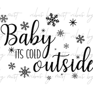May include: Black and white graphic with the phrase "Baby it's cold outside" in a cursive font, surrounded by snowflake and star illustrations. A winter-themed design.