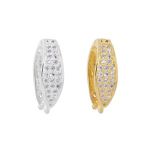 May include: Two jewelry clasps, one silver and one gold, with a row of clear cubic zirconia stones.