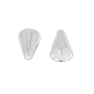 May include: Two silver-colored, cone-shaped jewelry findings. One finding is upright, and the other is inverted, showing the hollow interior. These findings are likely used in jewelry making for stringing beads or other decorative elements.
