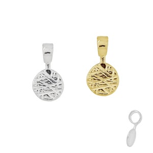 May include: Two round, textured, metal pendant charms, one gold and one silver, with a loop at the top. A third, smaller, silver charm with a loop at the top is also shown.