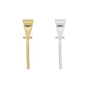 May include: Two pendant bails, one gold and one silver, with a loop at the top and a long, thin pin at the bottom.