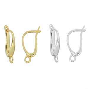 May include: Two pairs of earring clasps, one pair is gold and the other is silver. The clasps are shaped like a teardrop with a small loop at the top.