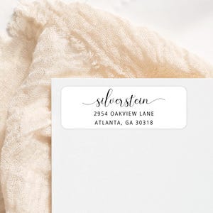 May include: White return address label with black text. The text reads "silverstein", "2954 Oakview Lane", and "Atlanta, GA 30318".