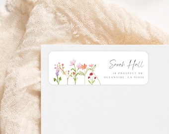 May include: A white return address label with a floral design and the text "Sarah Hall, 18 Prospect Dr., Oceanside, CA 92056".