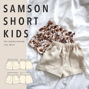 May include: A PDF sewing pattern titled SAMSON SHORT KIDS for sizes 3M-6Y, featuring two pairs of shorts: one in a beige solid colour and one with a brown and white floral print. Both shorts have an elastic waistband and two front pockets.