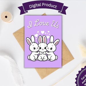 Peut inclure: Une carte violette avec le texte "I Love Us" et une image de deux lapins blancs en train de se faire un câlin. La carte mesure 7 pouces par 5 pouces.