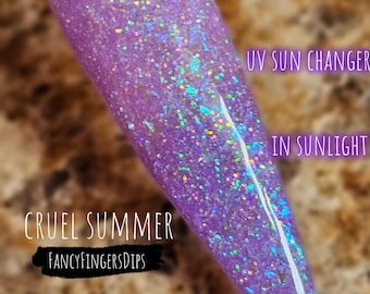 Cruel Summer - Polvo acrílico con purpurina que cambia de color lila a violeta y efecto rayos UV