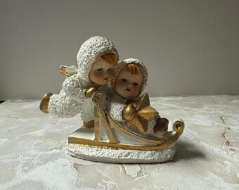 Vintage K's Collection of Snow Angels on a Sled
