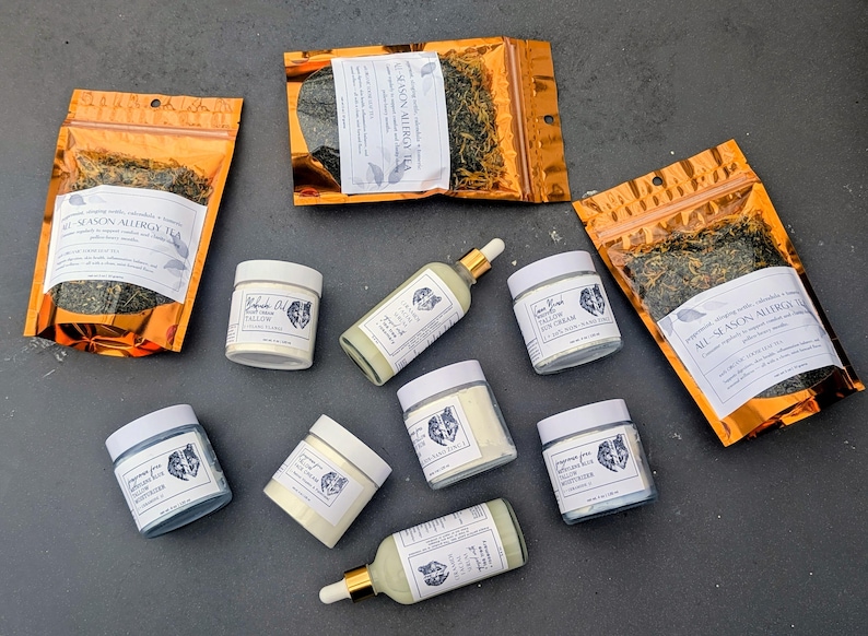 Skincare and wellness collection on dark gray background