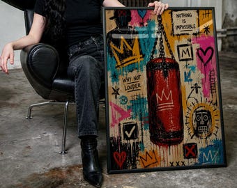 May include: A framed rectangular wall art piece featuring a central red punching bag hanging from a chain. The artwork includes graffiti-style elements, crowns, hearts, and the text "NOTHING IS IMPOSSIBLE" and "WHY NOT LOUDER" in a vibrant, multi-colored palette.