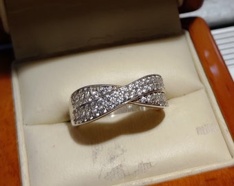 Vintage sterling silver stunning dress ring with CZ inlaid in a criss cross style band, exceptionally sparkly