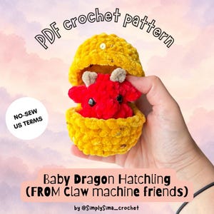 May include: A PDF crochet pattern for a baby dragon hatchling. The plush toy features a bright red dragon with small horns inside a textured yellow egg shell. Text on the image reads: PDF crochet pattern, NO-SEW US TERMS, Baby Dragon Hatchling.