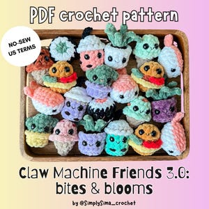 May include: A collection of colorful, crocheted plush toys, including sushi, boba tea, and potted plants, arranged on a wooden tray. The text "PDF crochet pattern" and "Claw Machine Friends 3.0: bites & blooms" are visible. The phrase "NO-SEW US TERMS" is also present.