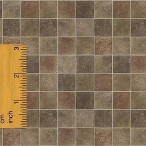 May include: A close-up of a brown and beige tiled floor with a wooden ruler measuring 8 inches. The ruler has markings in both inches and centimetres.