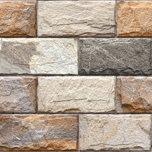 May include: A wall made of stone tiles in shades of brown, gray, and white. The tiles are arranged in a brick pattern.