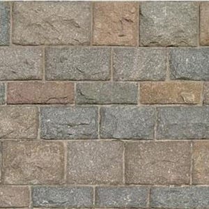 May include: A wall constructed from rectangular stone blocks featuring a textured, rugged surface. The stones display a varied color palette of muted grays, earthy browns, and subtle tan tones, arranged in a standard horizontal running bond pattern.