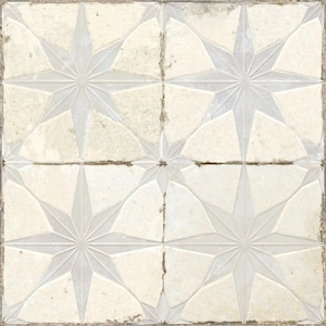 May include: Square tile with a repeating starburst pattern. The design features eight-pointed stars in a light grey colour, set against a creamy, off-white background. The tile has a slightly aged, textured appearance.