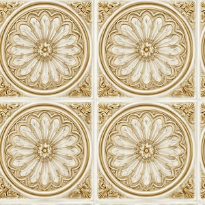 May include: A repeating pattern of square wall tiles featuring a central circular medallion with intricate gold filigree and floral petal details set against a cream-colored background, with ornate gold corner accents on each square tile.