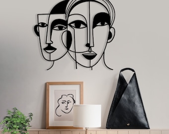 Abstrakcyjne twarze, metalowa sztuka ścienna: wystrój domu w stylu kubizmu