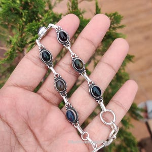 Svart eldopalarmband: Elegant smycke 925 sterlingsilver justerbart armband