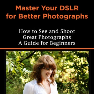 May include: A book cover with a woman smiling in a white shirt in front of a green background. The title is "Master Your DSLR for Better Photographs: How to See and Shoot Great Photographs A Guide for Beginners".