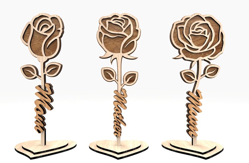 May include: Three wooden rose cutouts with a heart-shaped base. Each rose has a different name written on the stem: "Mom", "Mother", and "Mama".