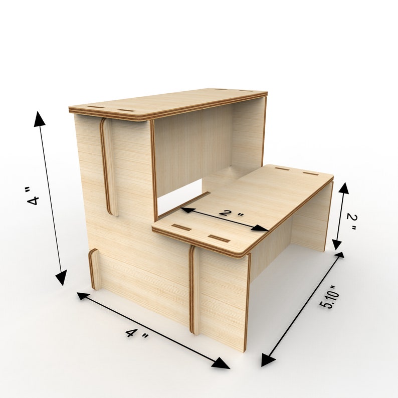 K&ouml;nnte beinhalten: Ein zweistufiger Holzhocker mit einer Basis von 10,16 cm x 10,16 cm und einer H&ouml;he von 13 cm. Die obere Stufe ist 5,08 cm breit und die untere Stufe ist 5,08 cm breit.