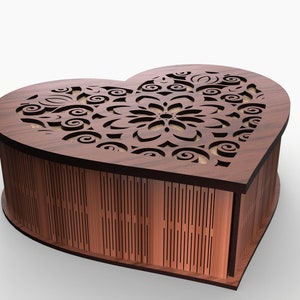 May include: A heart-shaped wooden box with a delicate, intricate laser-cut design on the lid. The box is made of dark brown wood and has a smooth finish.