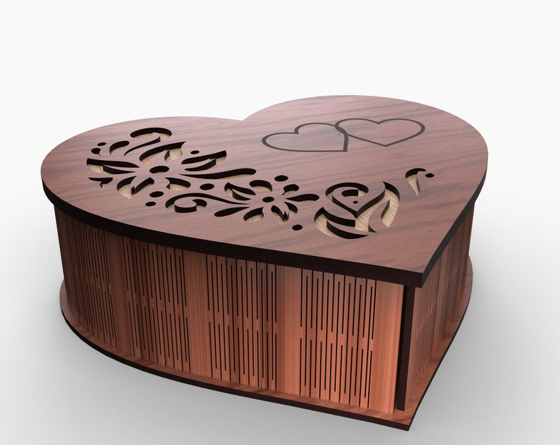 May include: A heart-shaped wooden box with a decorative floral design and two hearts cut out on the top. The box is made of dark wood and has a smooth finish.