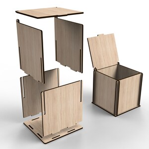 Op de afbeelding: Een houten doos met een deksel, gedemonteerd in zijn afzonderlijke onderdelen. De doos is gemaakt van lichtbruin hout en heeft een eenvoudig, rechthoekig ontwerp.