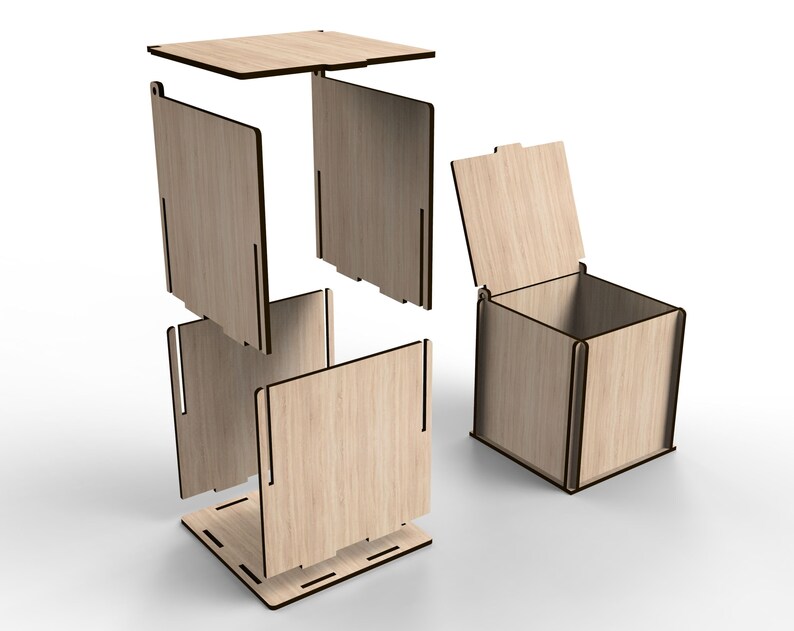 Op de afbeelding: Een houten doos met een deksel, gedemonteerd in zijn afzonderlijke onderdelen. De doos is gemaakt van lichtbruin hout en heeft een eenvoudig, rechthoekig ontwerp.