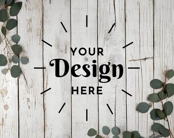 May include: Whitewashed wood background with a clock face design and the text "YOUR Design HERE".  The background is decorated with sprigs of eucalyptus.