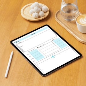 May include: A digital tablet displaying a flight information form with light blue accents. A white stylus rests beside the tablet on a wooden surface. A wooden tray holds a glass of water, a cup of coffee, and a small plate of white treats.