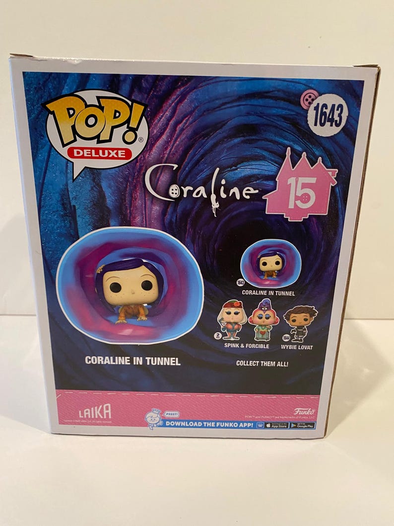 May include: A Pop! Deluxe vinyl figure of Coraline from the movie Coraline. The figure is in a blue and purple tunnel. The box has the text "Pop! Deluxe" and "Coraline 15" on it. The box also has the text "Coraline in Tunnel" and "Collect Them All!" on it.