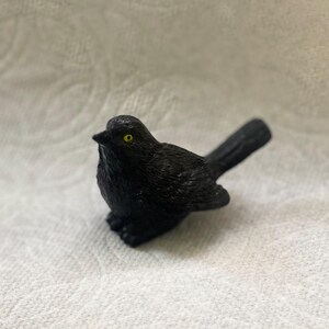 song bird figurines brewers blackbird