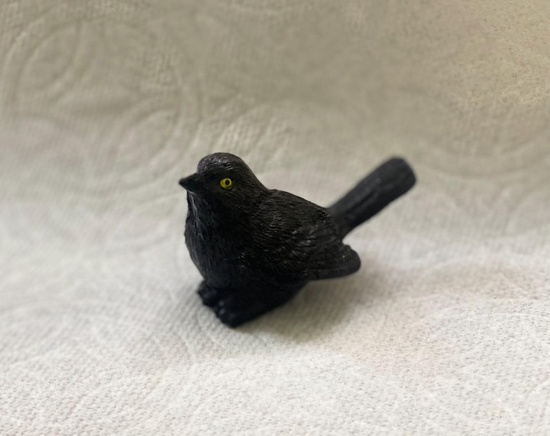 song bird figurines brewers blackbird