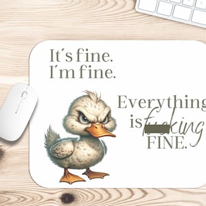 May include: White mousepad with a cartoon duck with an angry expression. The mousepad has the text "It's fine. I'm fine." and "Everything is f***ing FINE."