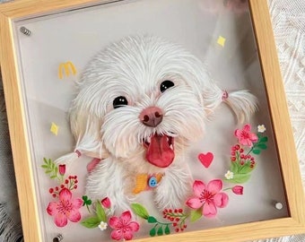 Könnte beinhalten: Ein gerahmtes Papierkunstwerk mit einem weißen, flauschigen Hund mit rosa Blumen und grünen Blättern drumherum. Der Hund lächelt mit herausgestreckter Zunge.