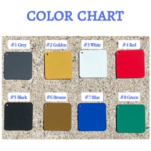 Puede incluir: Carta de colores con ocho cuadrados de diferentes colores. Los colores son gris, dorado, blanco, rojo, negro, bronce, azul y verde.