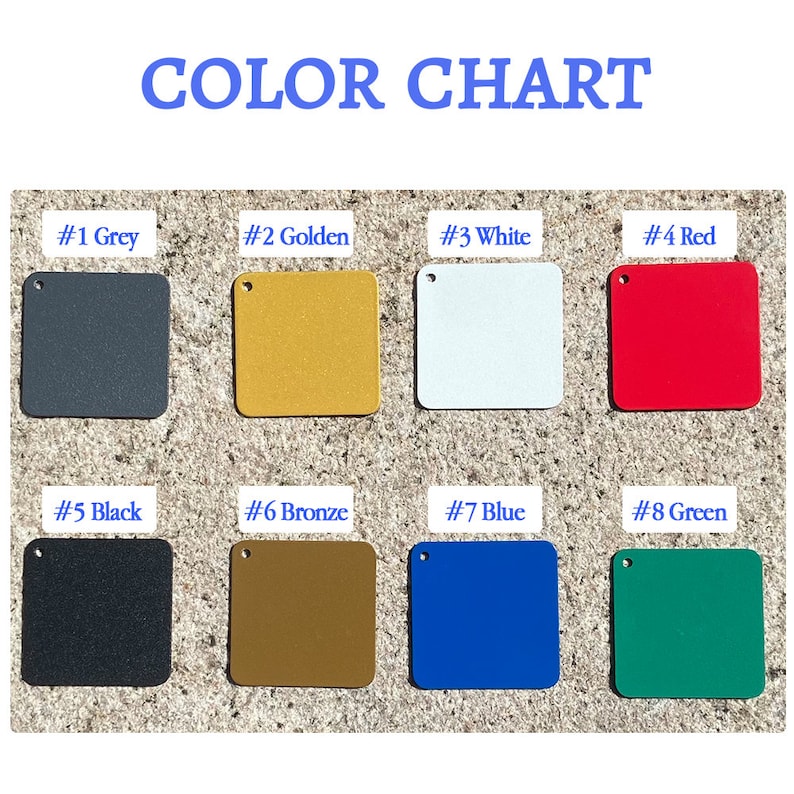 Puede incluir: Carta de colores con ocho cuadrados de diferentes colores. Los colores son gris, dorado, blanco, rojo, negro, bronce, azul y verde.