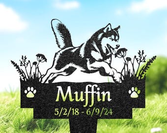 May include: Black and white metal pet memorial stake featuring a running dog silhouette. The name "Muffin" is displayed in green, along with the dates 5/2/18 - 6/9/24. Paw prints are on either side of the name.