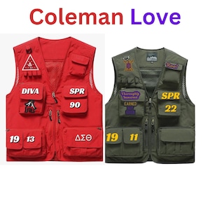 May include: Two utility vests, one red and one green, with various patches and embroidered text. The red vest has the text "DIVA", "SPR 90", "19 13", and "ΔΣΘ". The green vest has the text "Roo!", "Thoroughly Immersed", "EARNED NOT GIVEN", "SPR 22", "19 11".